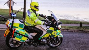 Police motorcycle test passed by Dr Ian Mew